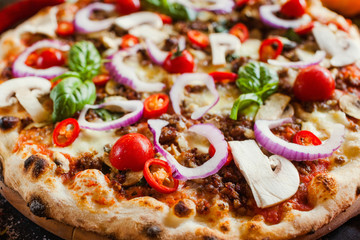 Wall Mural - Bolognese pizza with minced meat cherry tomatoes. Piquant and palatable homemade meal