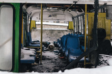The Abandoned Passenger Bus After The Explosion. Inside, You Can See Broken Armchairs And Broken Glass