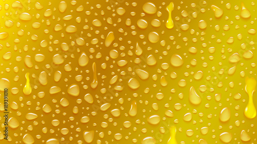 Background of water drops of different shapes with shadows in yellow colors © Olga Moonlight