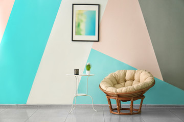 Wall Mural - Cozy armchair in room with minimalistic interior