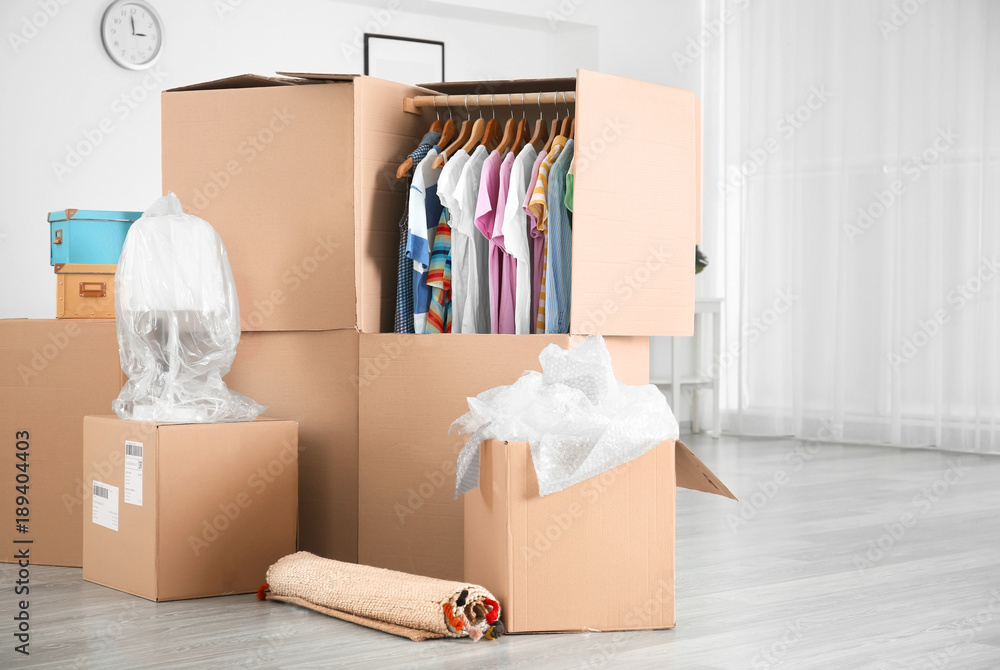 Wardrobe boxes with clothes indoors