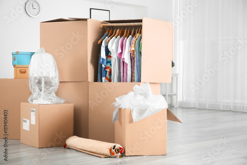 Wardrobe Boxes With Clothes Indoors Buy This Stock Photo And