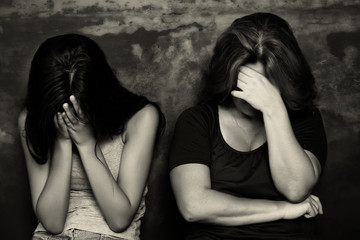 Wall Mural - Mother and her teenage daughter crying