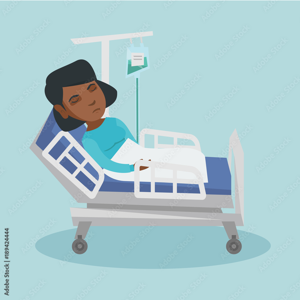 Young african-american woman lying in hospital bed with a drop counter ...