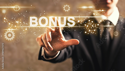 Fotomural Bonus text with businessman on dark vintage background