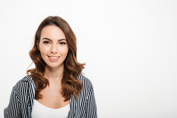 Poster - Portrait of a smiling casual girl looking at camera