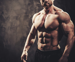 man showing his muscular body