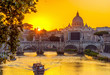 Sunset view of Basilica St Peter, bridge Sant Angelo and river Tiber in Rome. Italy