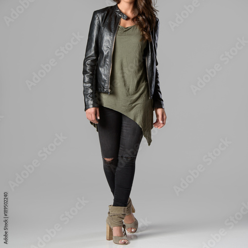 green top black jeans