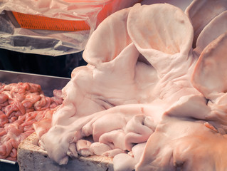 Pig head in a butchers shop, Bangkok, Thailand