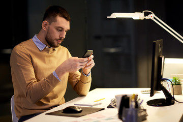 Sticker - man with smartphone working late at night office