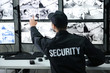 © Africa Studio - Male security guard working in surveillance room