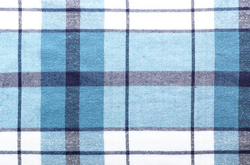 Plaid cotton fabric texture as background, closeup