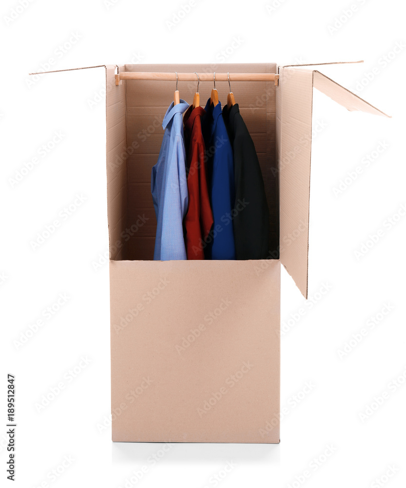 Wardrobe box with clothes on white background