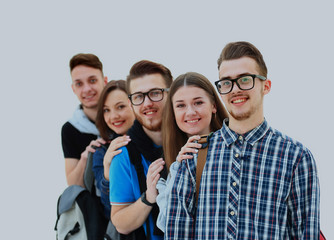 Canvas Print - Happy young group of people standing togethe