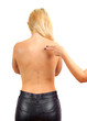 © Sergey - Female hand shows big birthmark on the female back