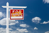 Fototapeta Las - Right Facing Sold For Sale Real Estate Sign Over Blue Sky and Clouds With Room For Your Text.