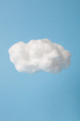 cloud made out of cotton wool on sky blue background