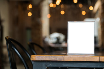 mock up menu object in cafe and restaurant,blank screen for booklet with white sheets of paper on wooden table on cafeteria,promotion and information for business mock up.