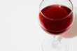 © 682A_IA - Isolated elegant glass of red wine on white background with space for menu or text