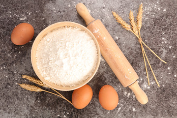 Wall Mural - bowl of flour, egg and rolling pin