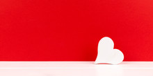 White Heart On Red Background Panorama