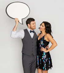 Wall Mural - happy couple at party holding text bubble banner