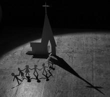 Paper Figures Of People Going To A Church With Shadow From Spotlight
