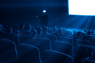 viewers watch a 3D movie, blue toning