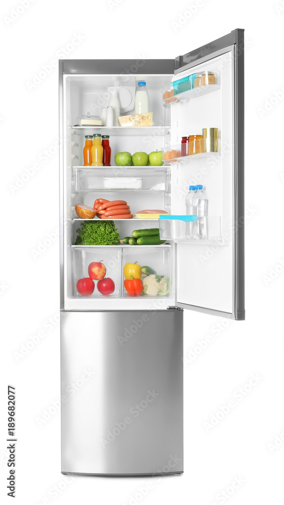 Refrigerator with fresh products on white background