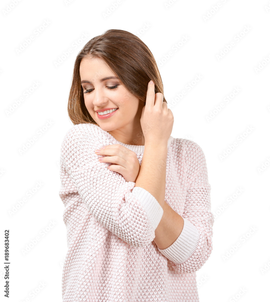 Young smiling woman on white background