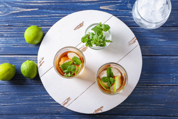 Wall Mural - Glasses with Cuba Libre cocktail on wooden board