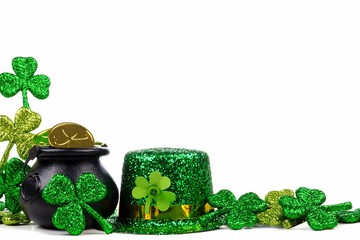 St Patricks Day Pot of Gold, shamrocks and leprechaun hat. Corner border over a white background.