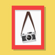 hanging vintage camera  with red picture frame