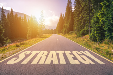 Wall Mural - Road concept - strategy, image of a road to the horizon with text strategy