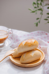 Morning breakfast with bread and coffee.