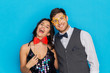© Syda Productions - happy couple with party props having fun