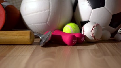 Wall Mural - Sports Equipment on wooden background