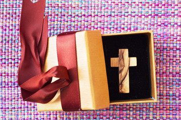 Cross in gift box