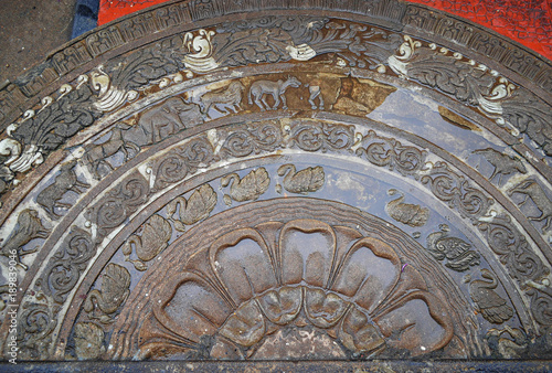 Fotografia, Obraz Moonstone relief depicting the cycle of sansara