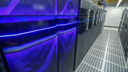 Wall Mural - room with rows of server hardware in data center timelapse hyperlapse