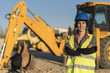 © FotoAndalucia - Sonriendte mujer trabajadora posa mirando a cámara