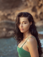 Wall Mural - Portrait of beautiful young woman on beach.