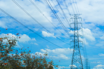 high voltage pole blue sky