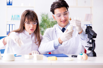 two lab doctor testing food products