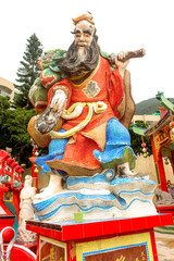 Wall Mural - Close up of red statue in Tin Hau Temple Repulse Bay in Hong Kong