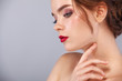 Closeup portrait of beautiful young woman with clean and fresh skin. Nude makeup. Model looking on copyspace. Concept for cosmetology ads, beauty magazine and spa.