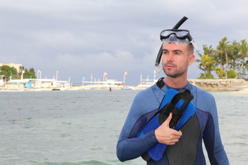 Wall Mural - Gorgeous man wearing wet suit