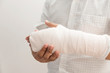 © chompoo - Arm of man splint mild injuries from accidents.