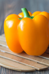 Wall Mural - Bell pepper on the wooden board